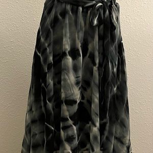 Very different tie-dyed multicolor full skirt. Fully lined.